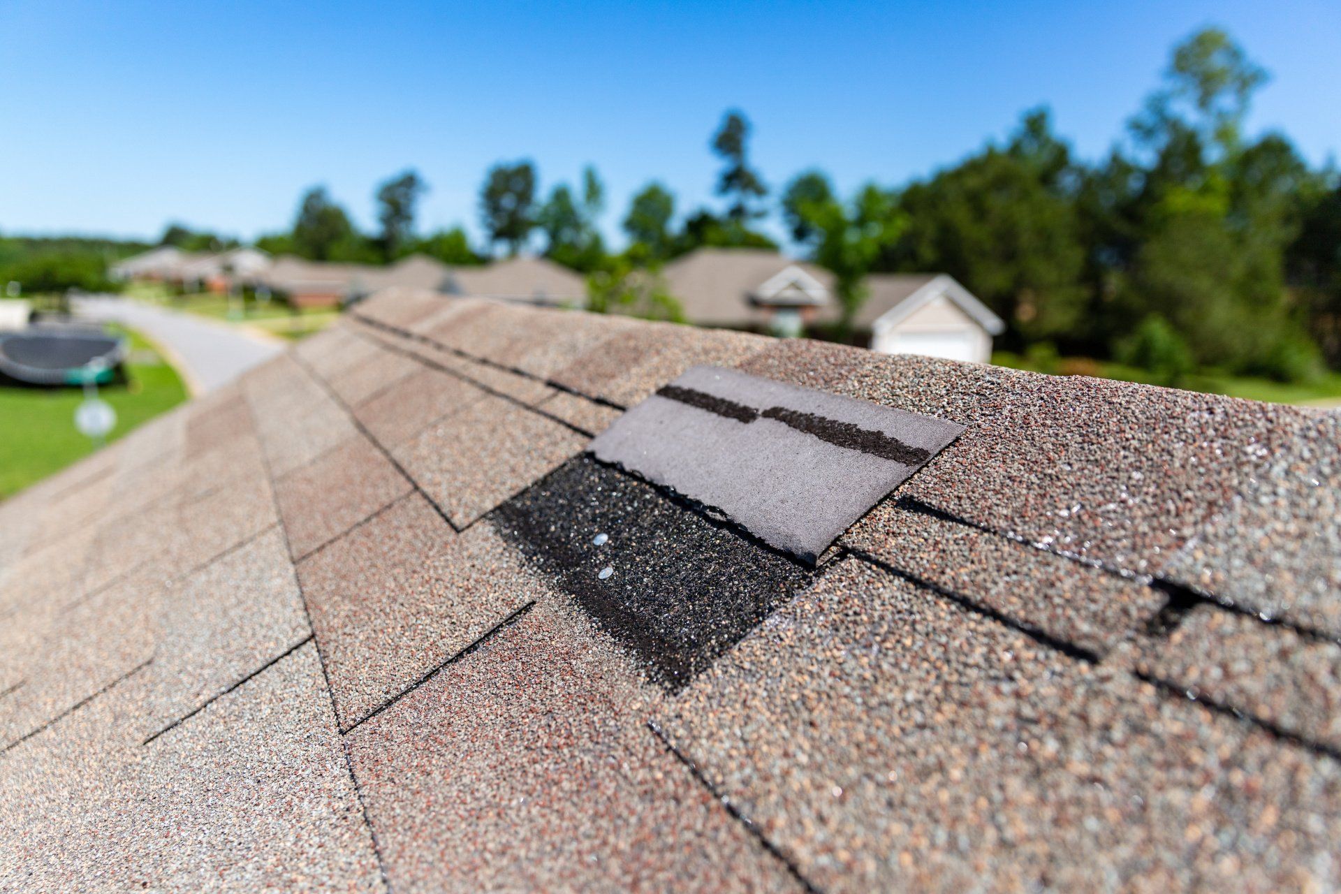 A close up of a roof with a hole in it.