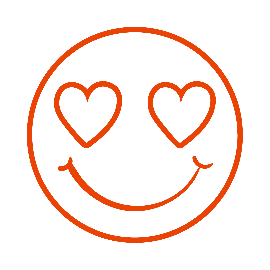 A smiley face with two hearts in its eyes.