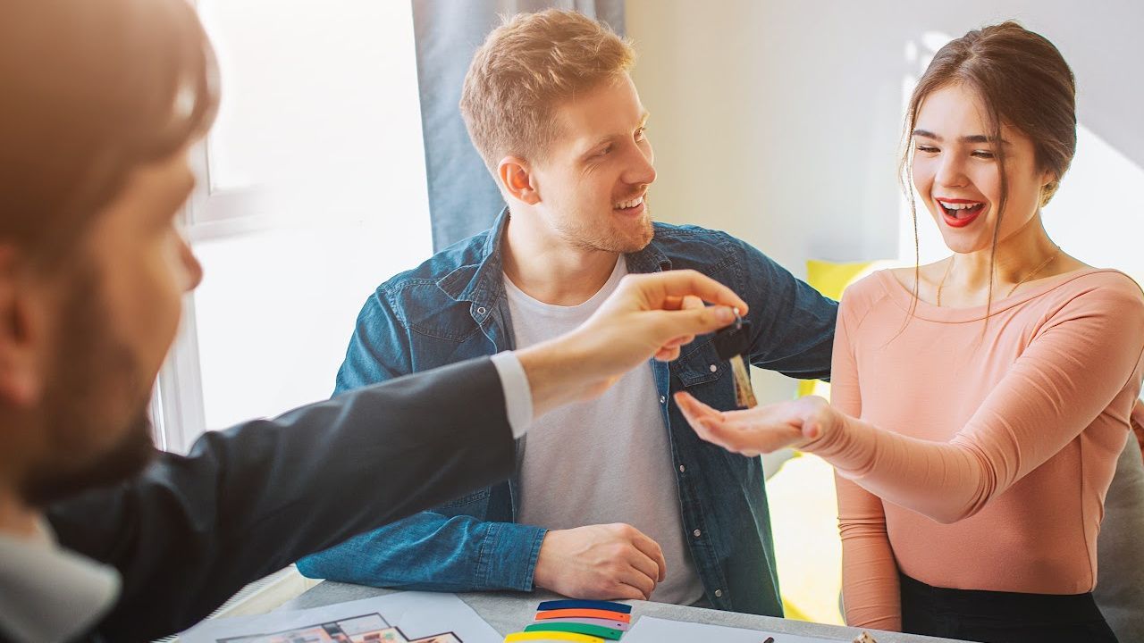 A man and a woman are playing a board game together.