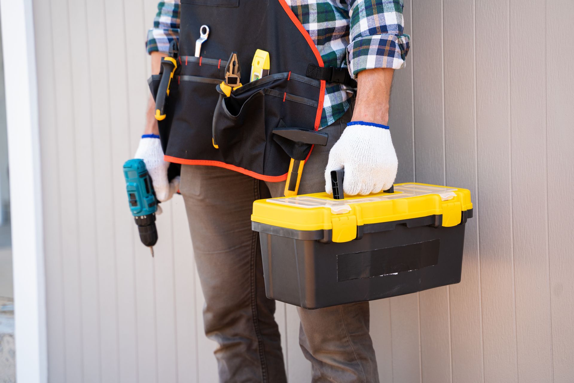 Man Holding A Toolbox — Pompano Beach, FL — Pac's Moving and Storage
