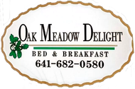 Logo for Oak Meadow Delight Bed & Breakfast, featuring text and a green oak leaf icon inside an oval, scalloped border.
