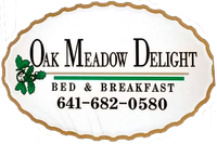 Logo for Oak Meadow Delight Bed & Breakfast, featuring text, green oak leaves, and the phone number 641-682-0580.