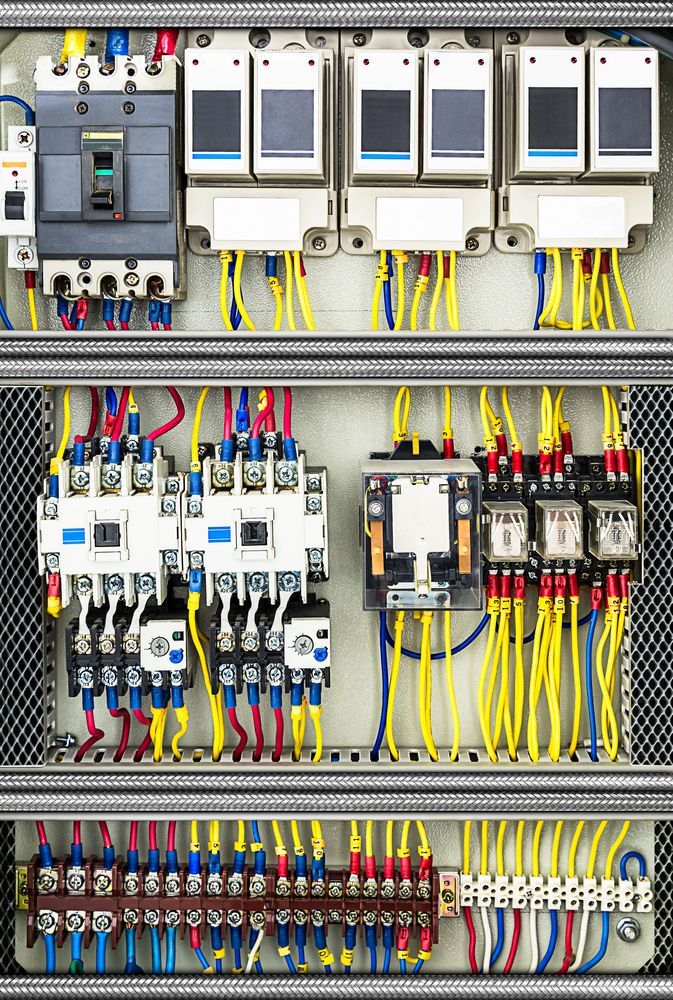 Electrical Control Panel With Wires of Various Colours, Breakers, and Relays — FAW Electrical in Nowra Hill, NSW
