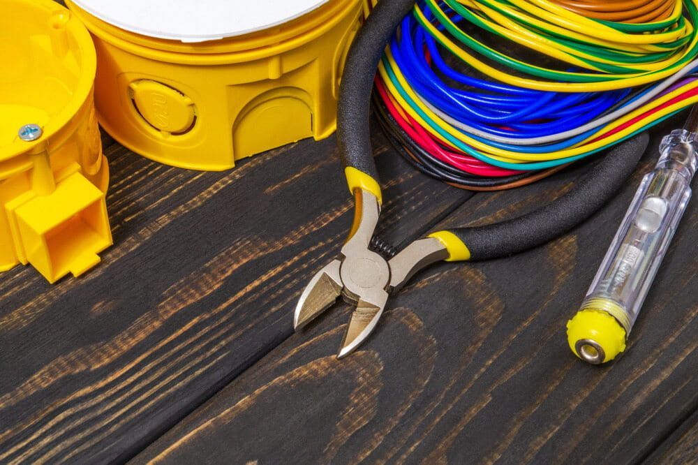 Electrical Tools and Supplies on a Wood Surface — FAW Electrical in Vincentia, NSW