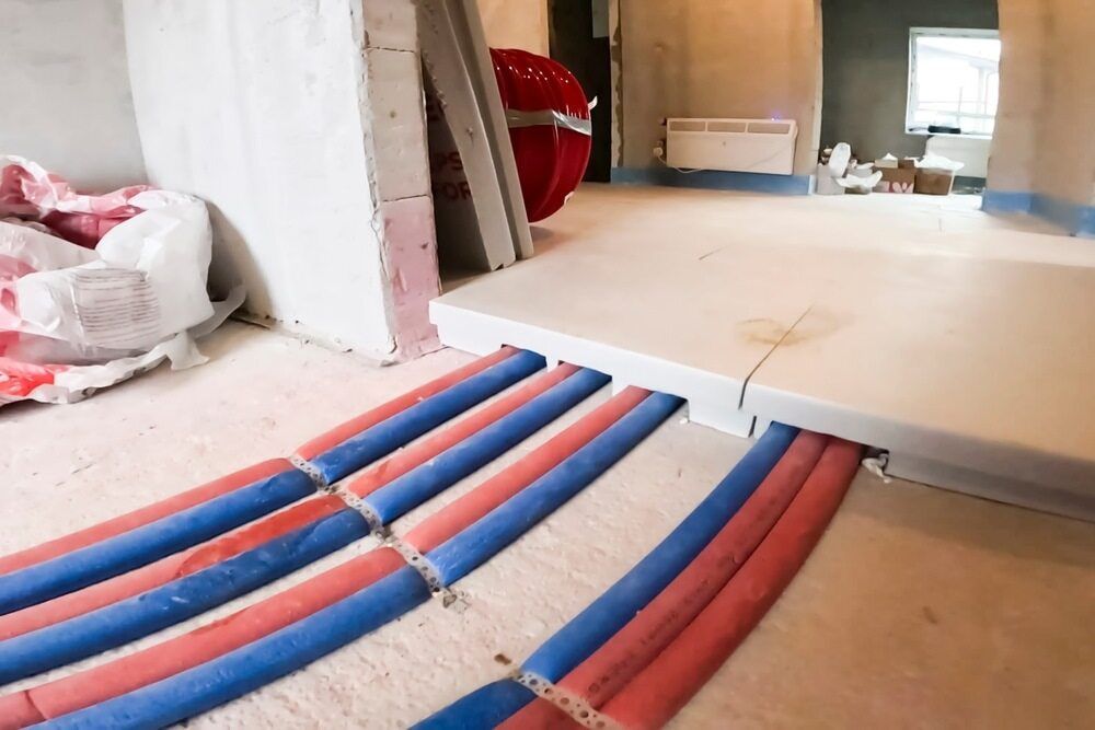 Pipes for Radiant Floor Heating Under Installation — FAW Electrical in Sussex Inlet, NSW