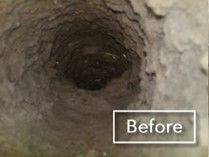 A black and white photo of a hole in a wall with a before sign.