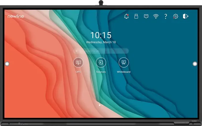 Wall-mounted interactive touchscreen display with coral and teal abstract interface on screen