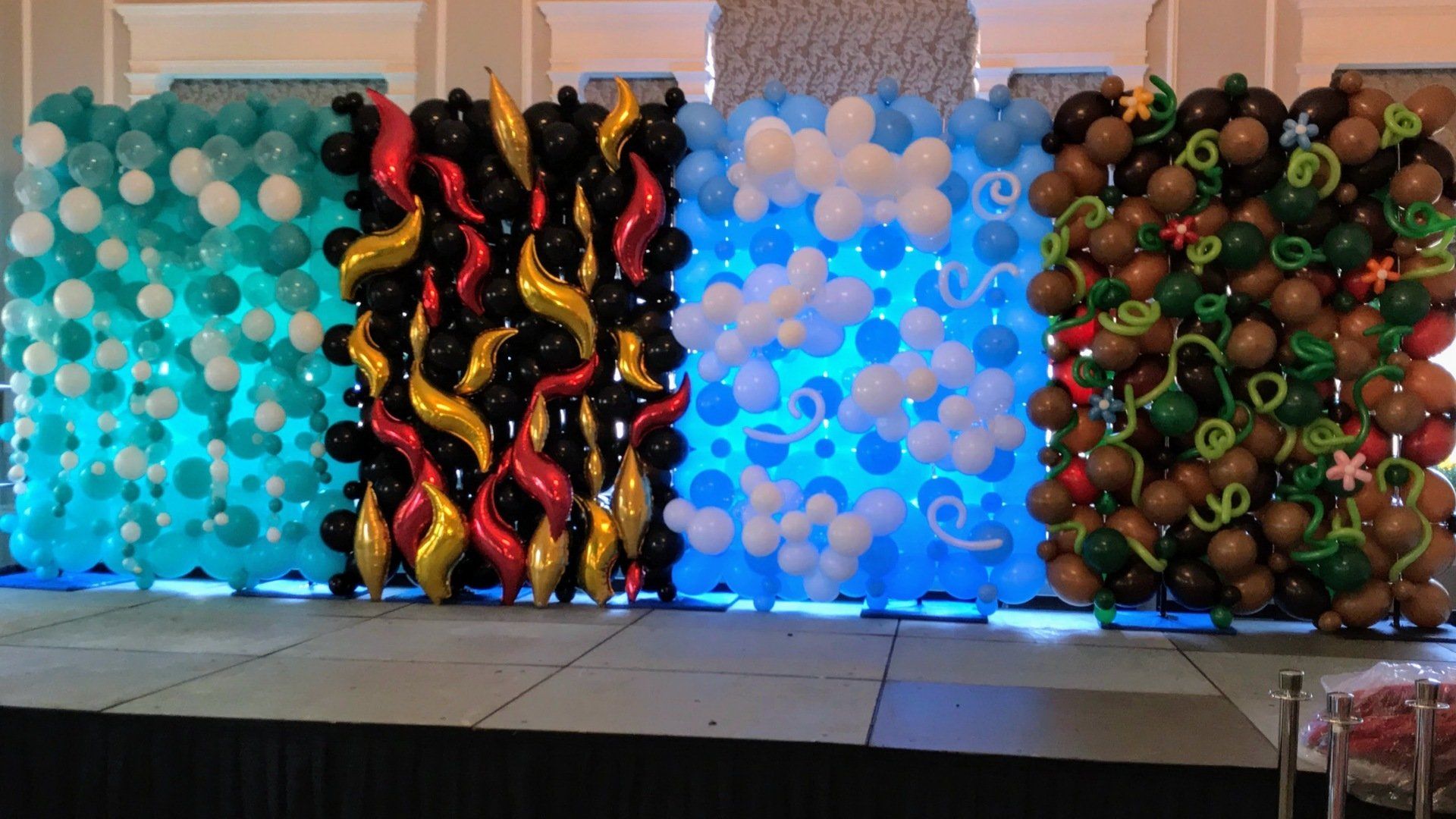 Fabulous balloon wall, in four elements. Fire, air, earth, water on Witch's Ball stage on Halloween