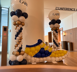 Boston Balloon Column and Balloon mosaic Sneaker sculpture 