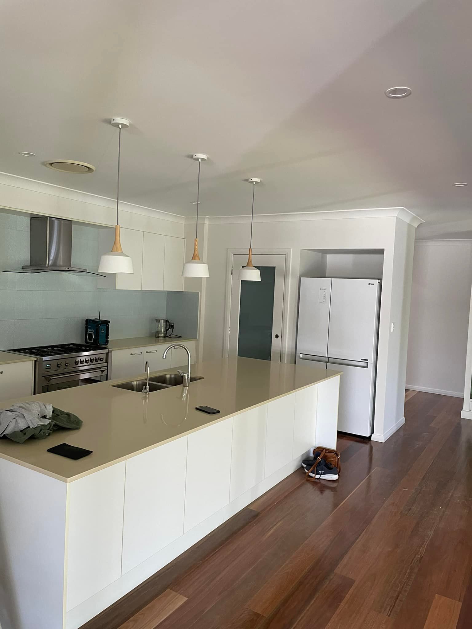 A Kitchen With White Cabinets — Karl Witt Painter & Decorator In Albion Park, NSW