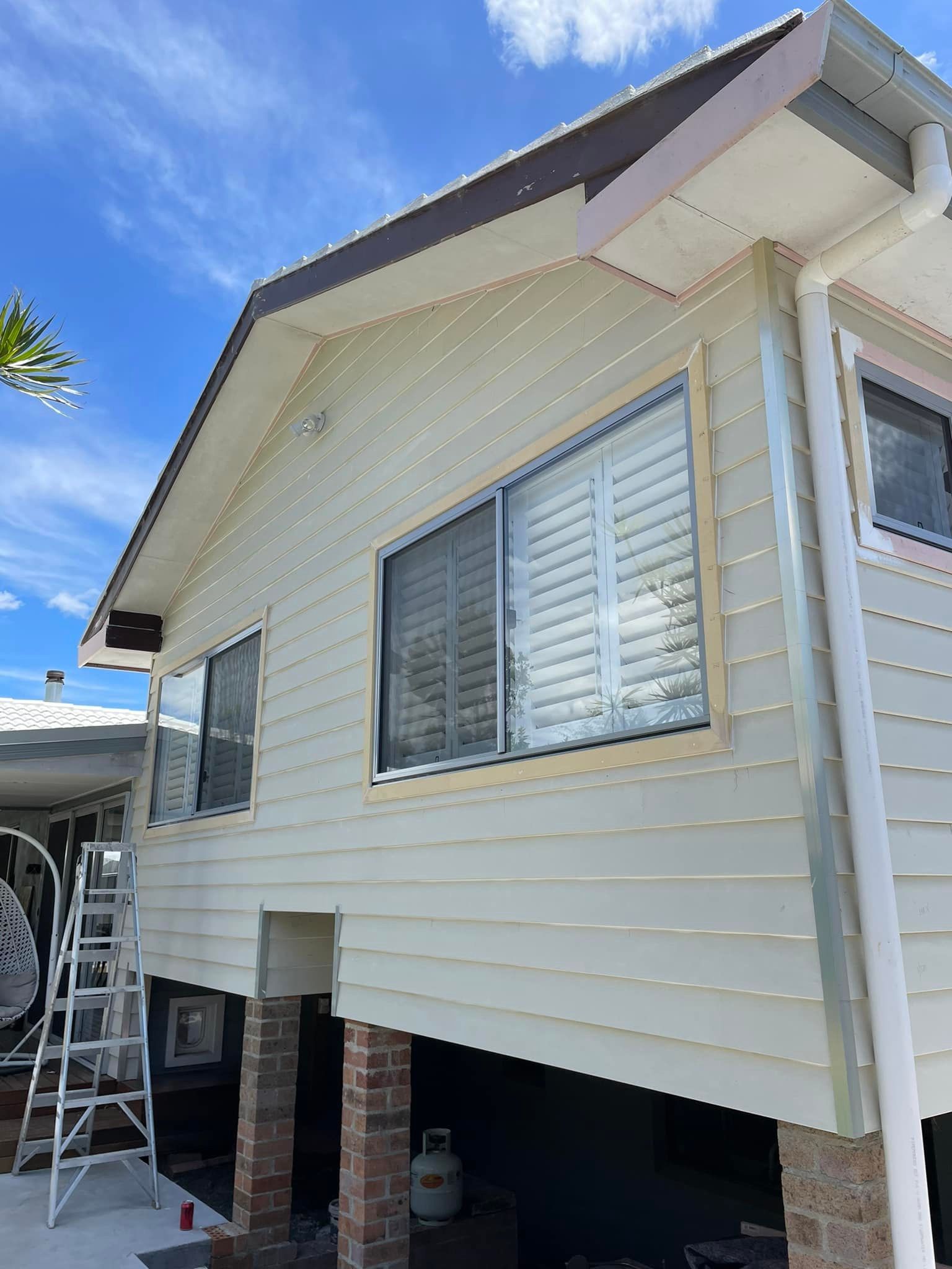 A House With a Wooden Slats Painted White— Karl Witt Painter & Decorator In Albion Park, NSW