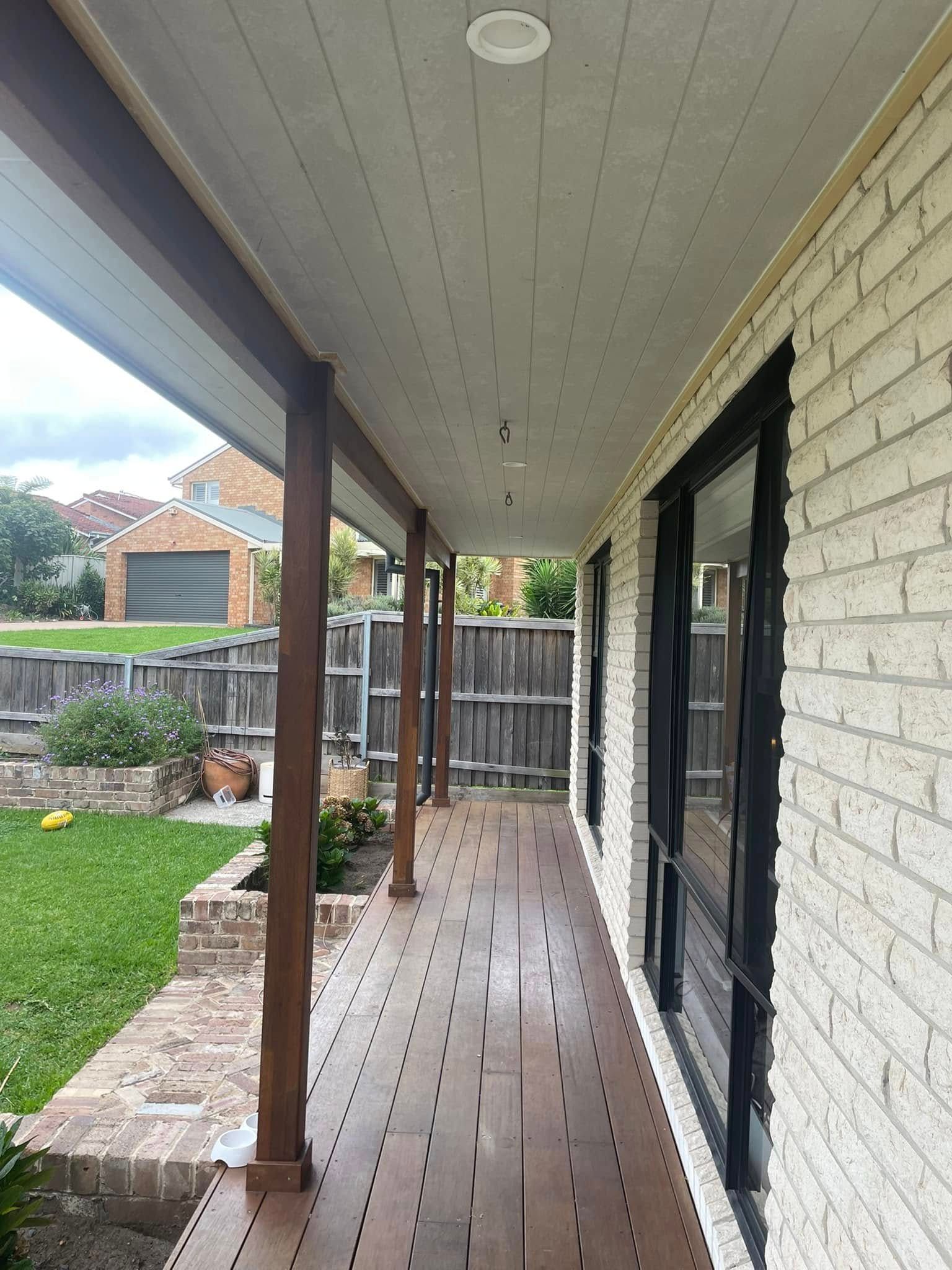 A Wooden Deck With Stairs — Karl Witt Painter & Decorator In Albion Park, NSW