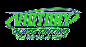 Logo for Victory Glass Tinting in green and black, with the slogan "All We Do Is Tint" in a bold, stylized font.