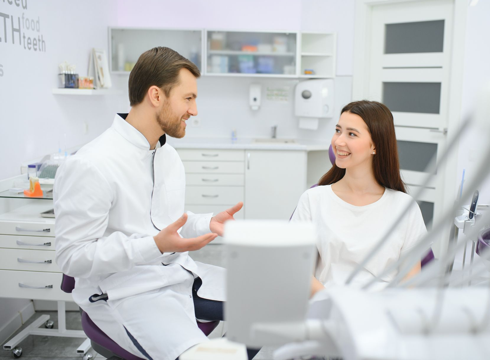 Experience the benefits of ozone therapy with a trusted biological dentist in Boise, ID A woman in a bathrobe is sitting in a chair with a syringe in her arm.