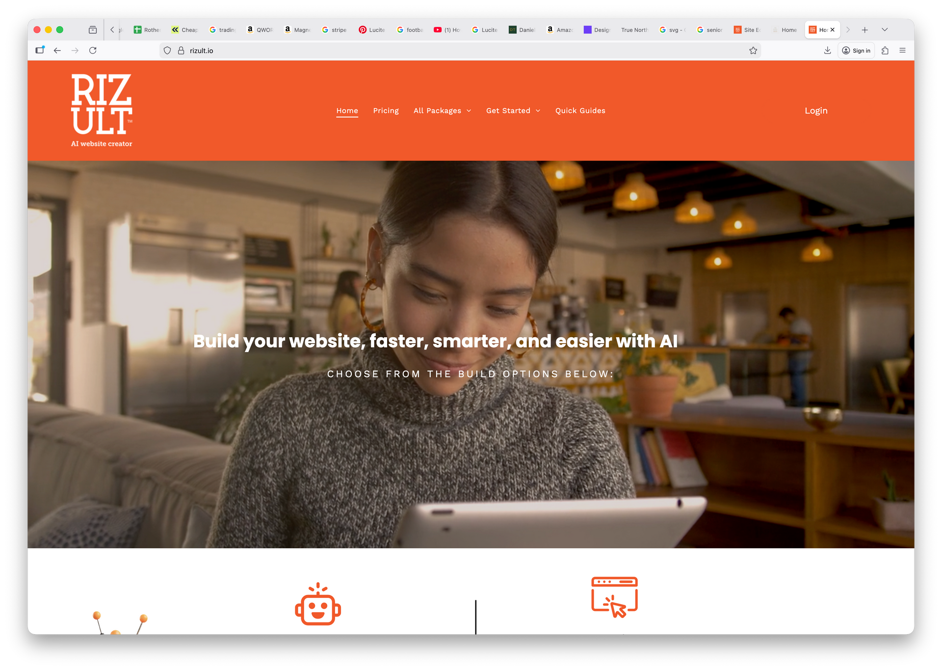 Website homepage with orange header and a woman using a laptop in a cozy café setting