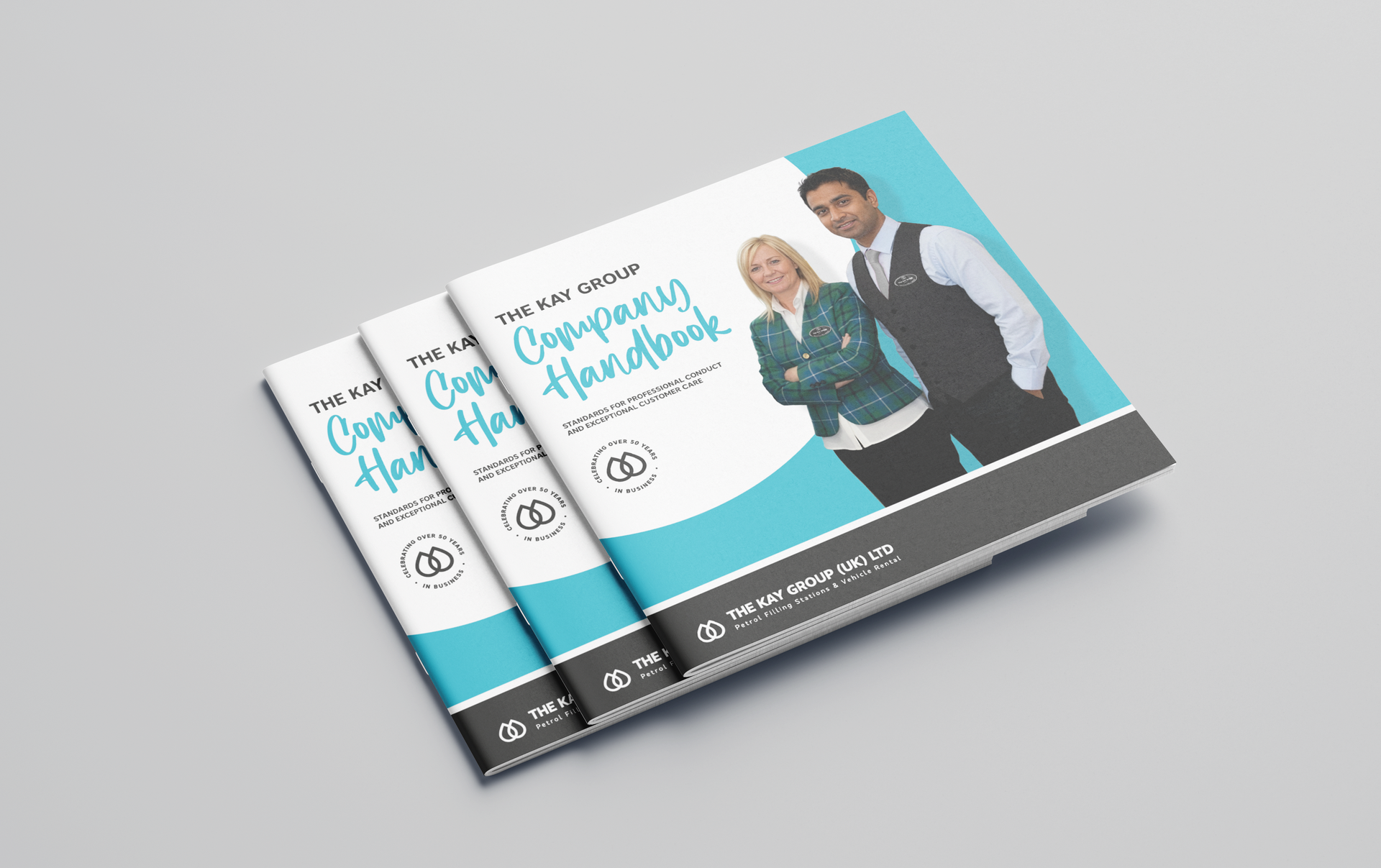 Three stacked brochures with teal and gray covers showing a smiling man and woman on the front.