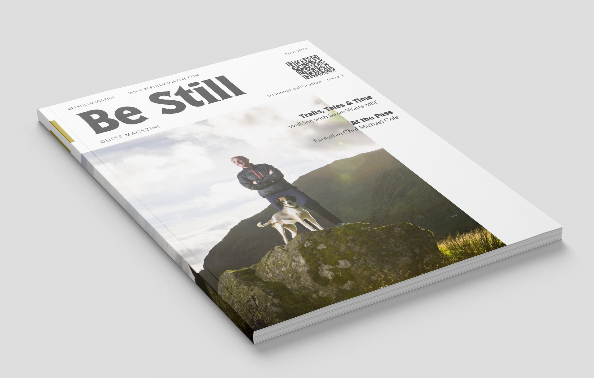 Magazine cover titled “Be Still” showing a hiker sitting on a rocky cliff above the sea.