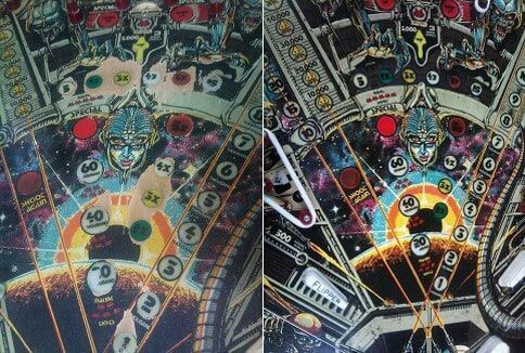 A close up of a pinball machine with the number 10 on it