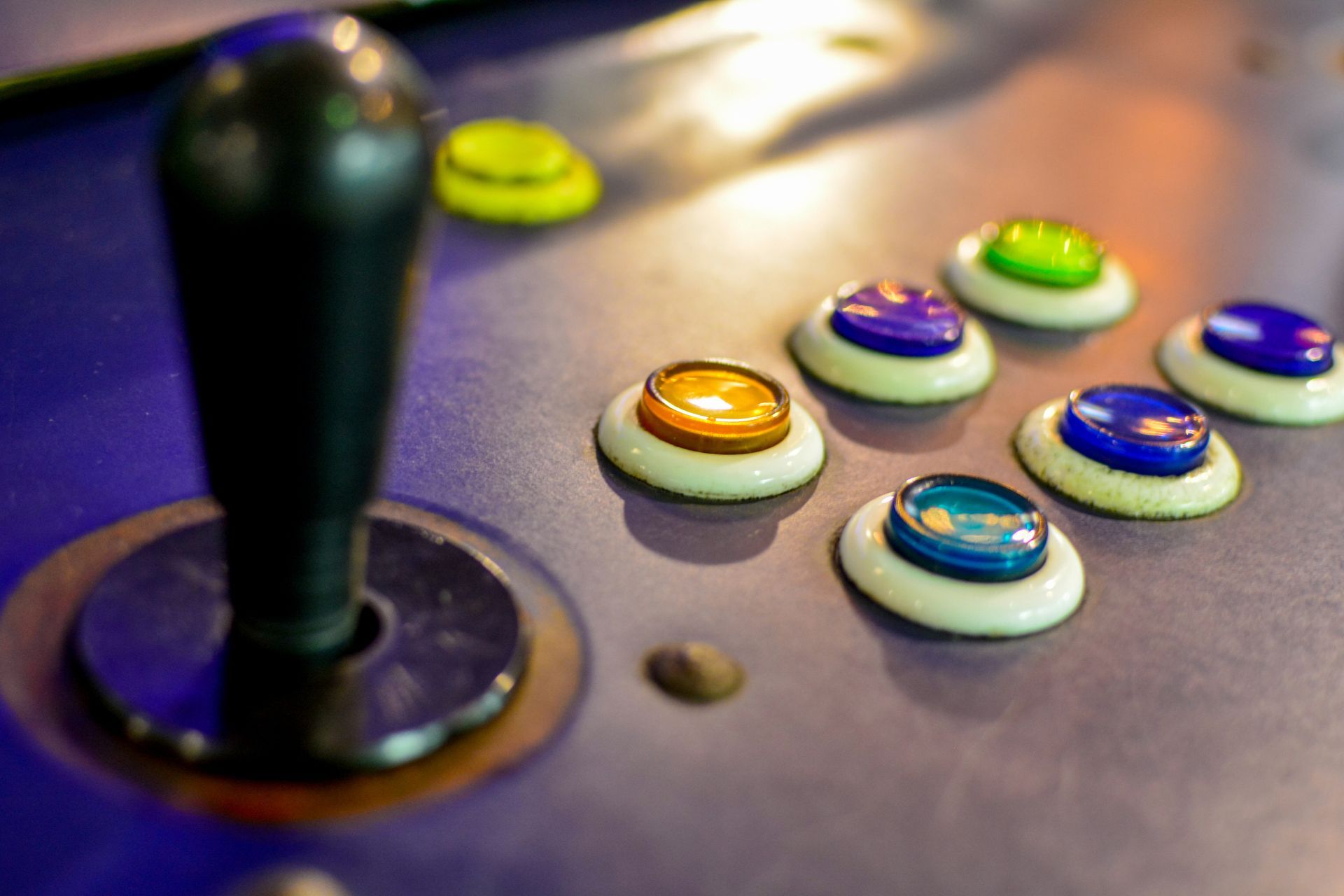 A close up of a joystick for a Residential Arcade Repairs