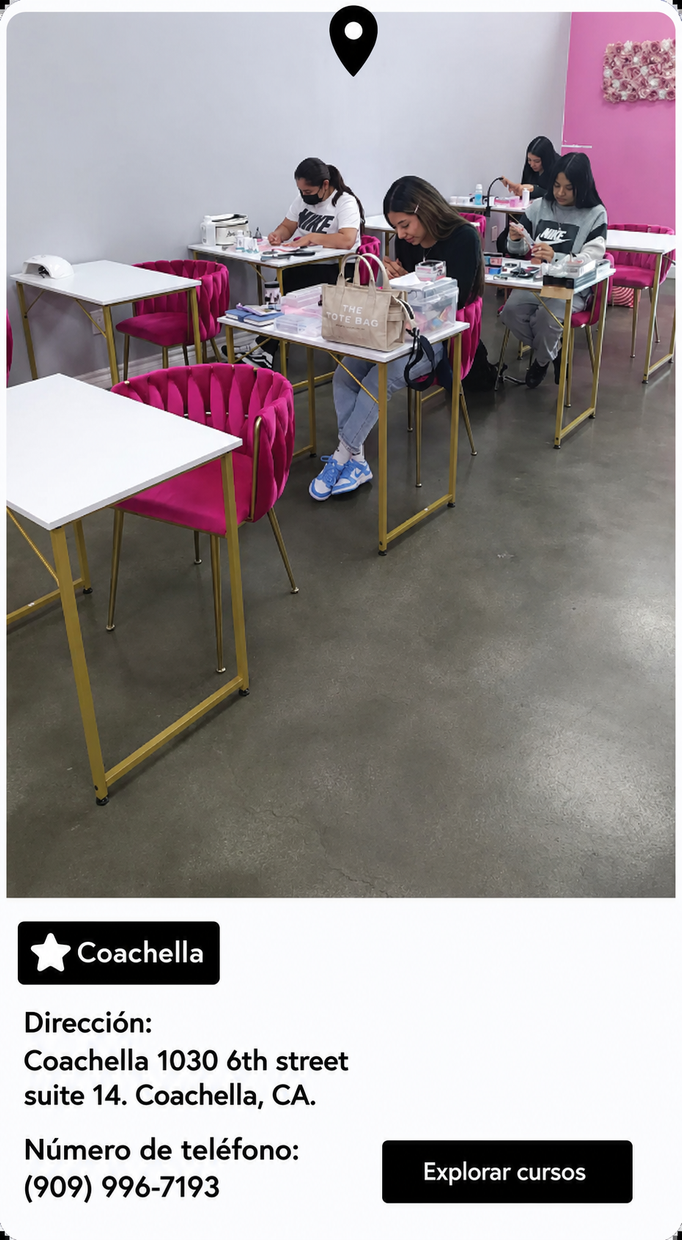 A group of people are sitting at tables in a classroom.