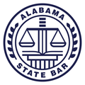 The logo for the alabama state bar has a scale of justice in the center.