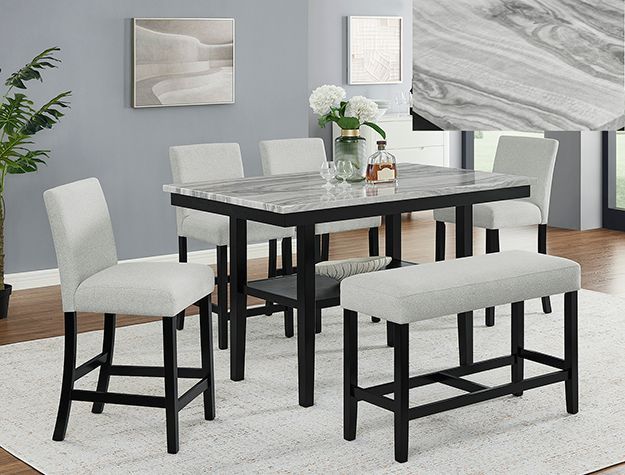 Modern dining room with black table, white upholstered chairs, and a bench on a light rug