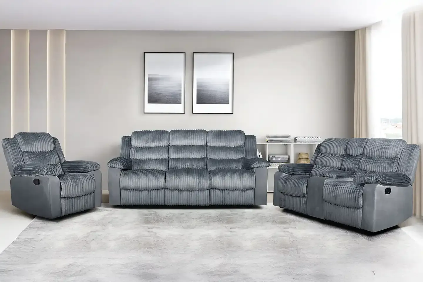 Gray living room set with sofa, loveseat, and armchair in a bright modern room