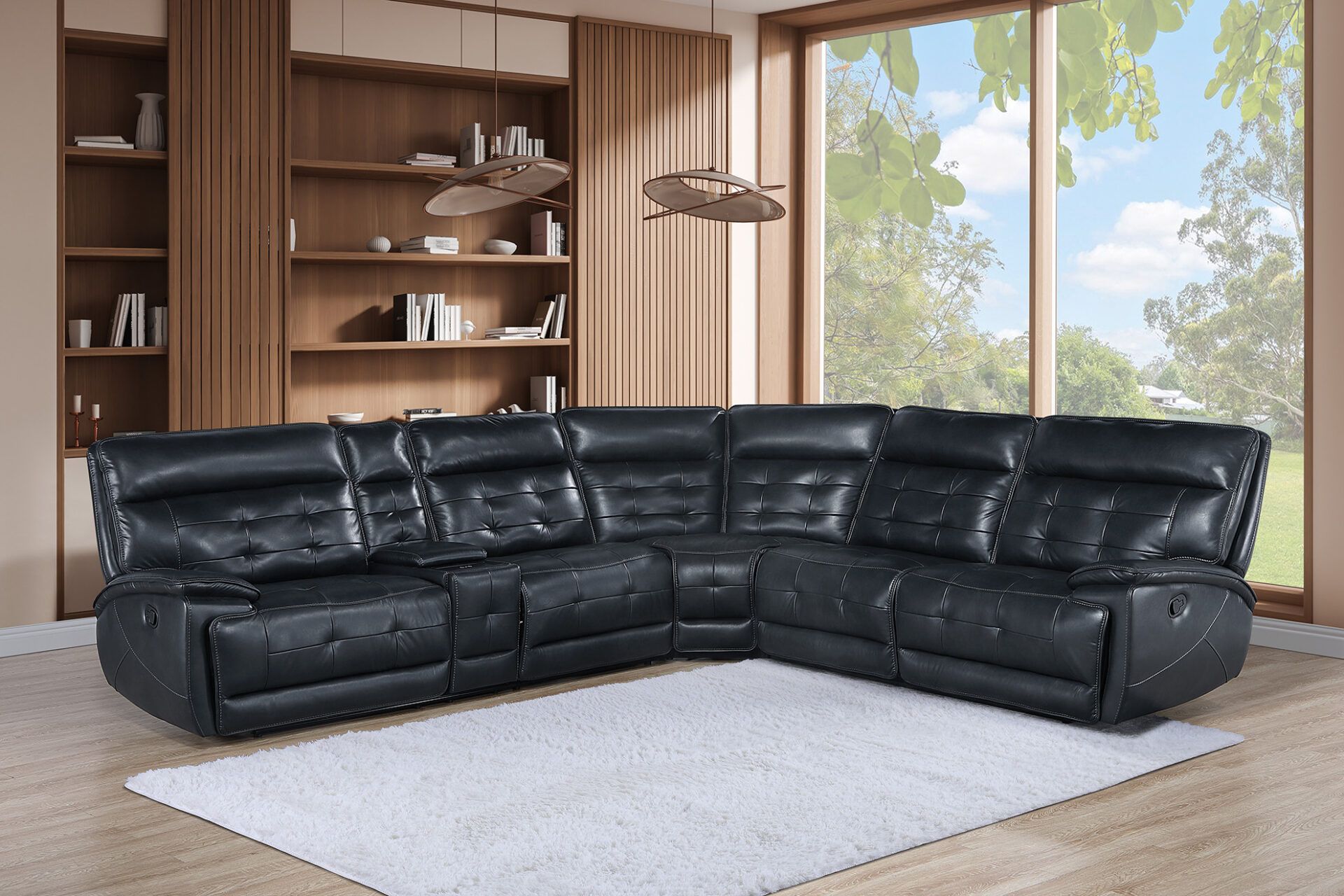 Black sectional sofa in a bright modern living room with wood shelves and a large window