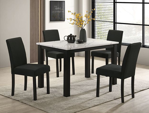 Black dining set with four chairs and white tabletop in a bright modern room