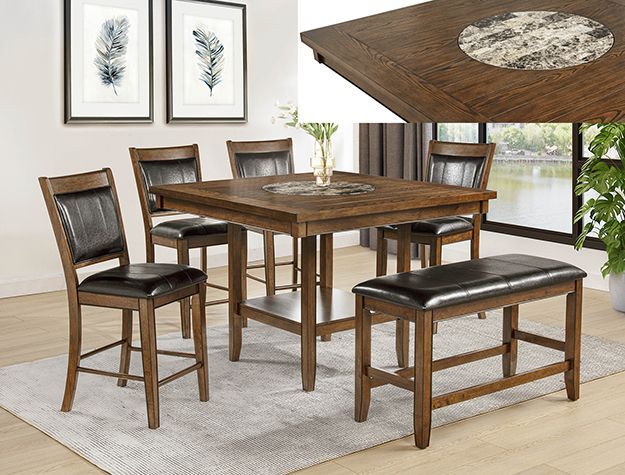 Wood dining set with chairs, bench, and table on a light rug in a bright room