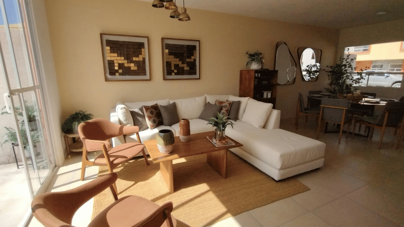 Space-saving living room furniture layout featuring a compact loveseat and accent chair