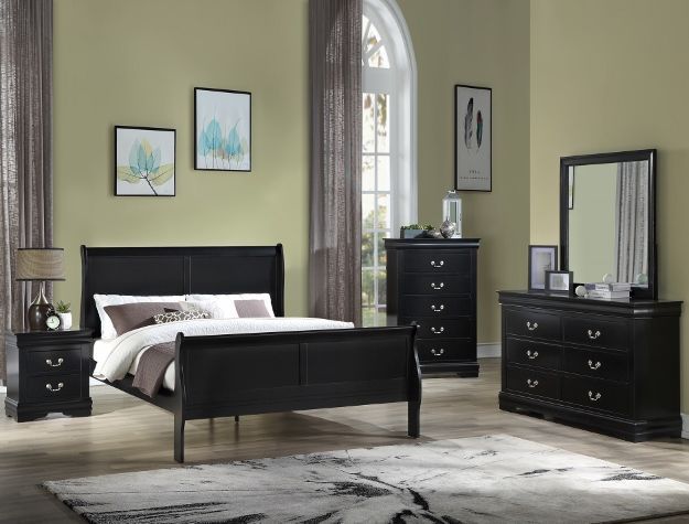 Black bedroom set with bed, dresser, nightstand, mirror, and framed wall art on pale walls