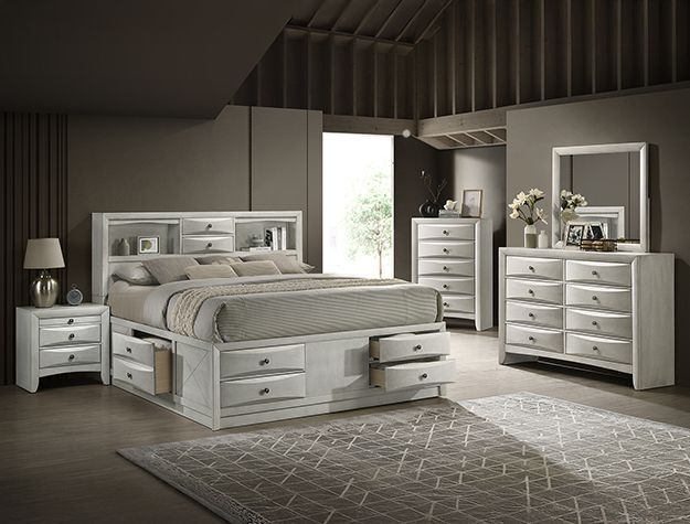 Modern gray bedroom set with bed, nightstands, dresser, mirror, and rug in a softly lit room