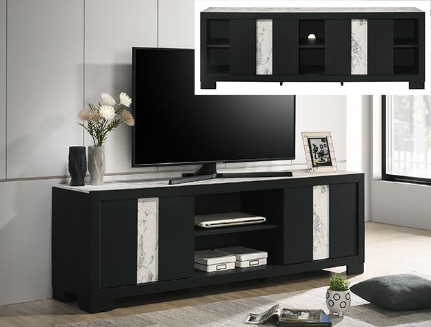 Modern black TV stand with shelves, flat-screen TV, decor, and a matching wall-mounted cabinet in a bright room