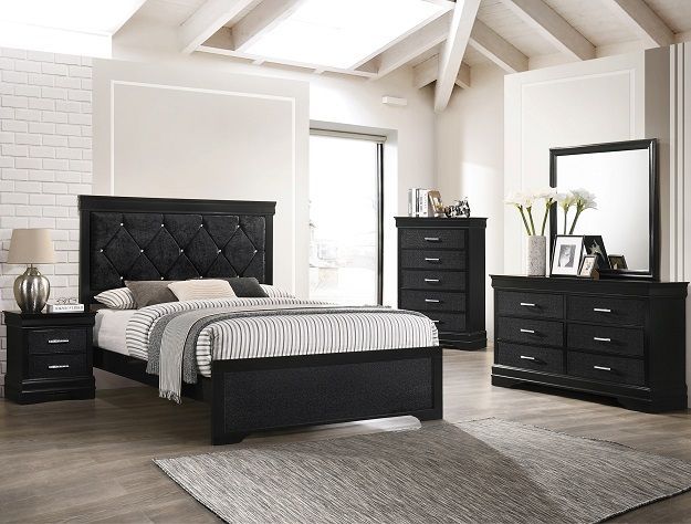 Modern bedroom with black furniture, striped bedding, a gray rug, and a large mirror