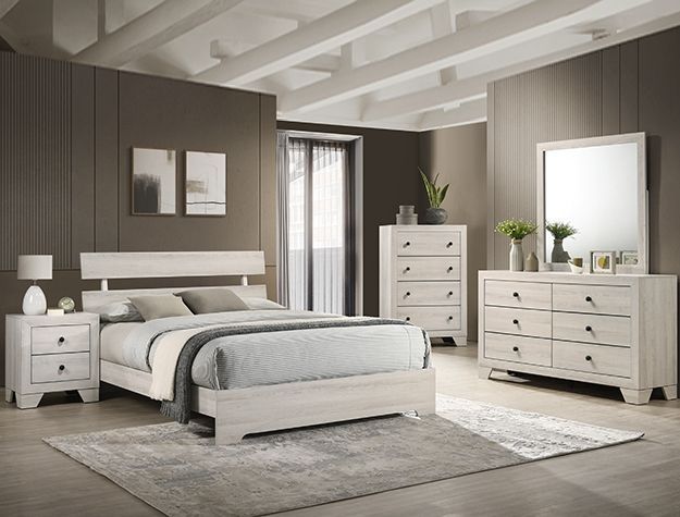 Modern gray bedroom with bed, nightstands, dresser, mirror, and light rug