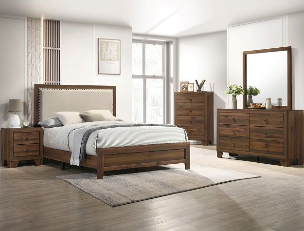 Modern bedroom with wooden bed, dresser, mirror, and nightstand in a bright neutral room