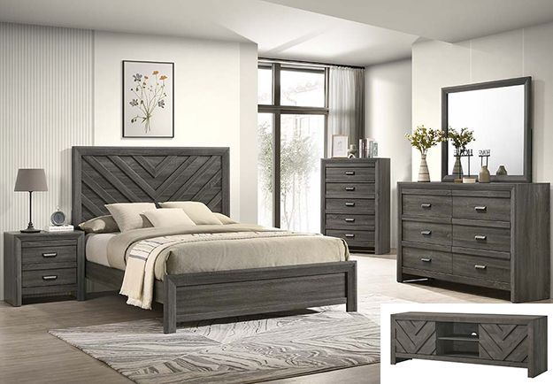 Modern gray bedroom set with bed, dresser, nightstands, mirror, chest, and rug in a bright room