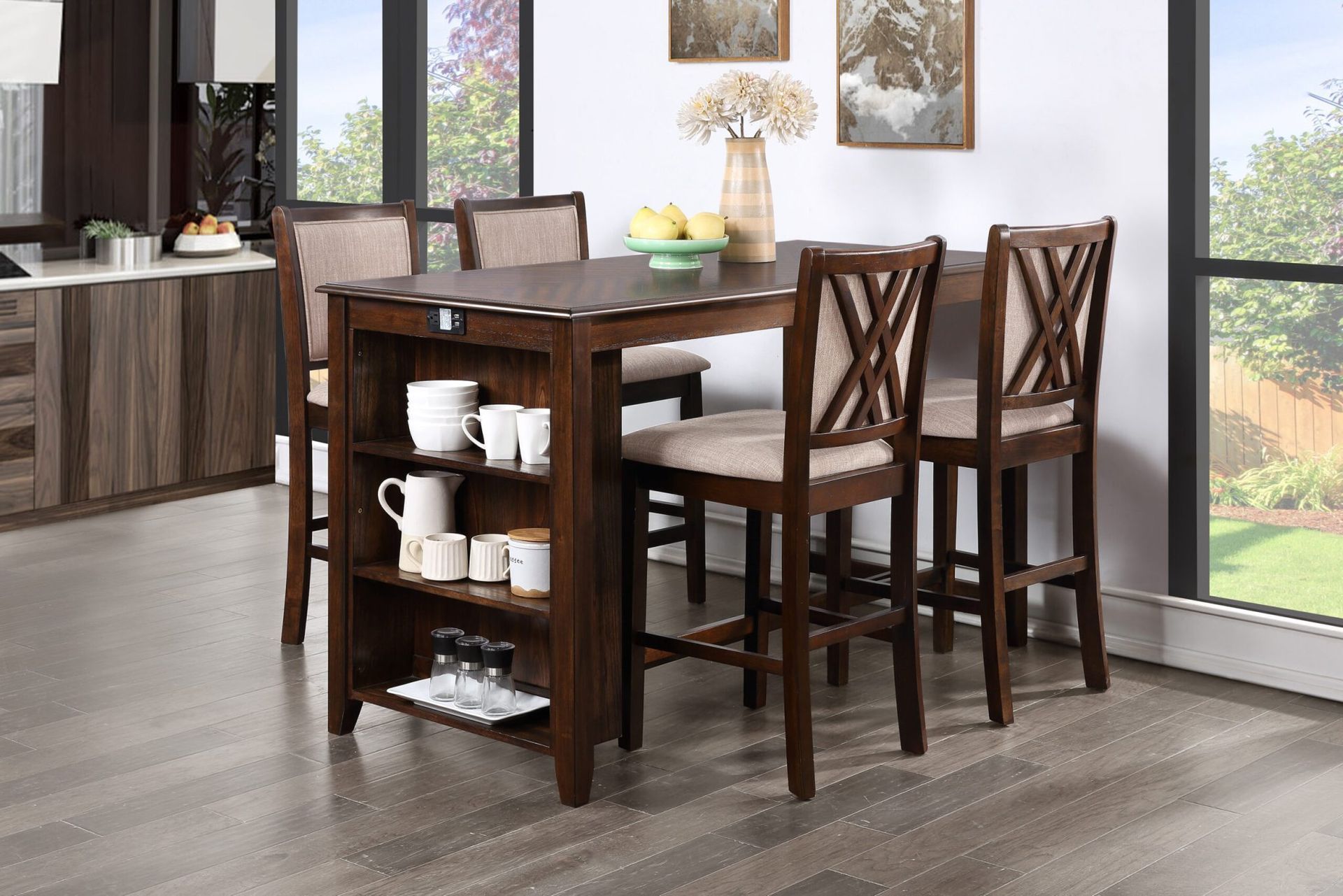 Dark wood dining table with four chairs in a bright modern kitchen nook