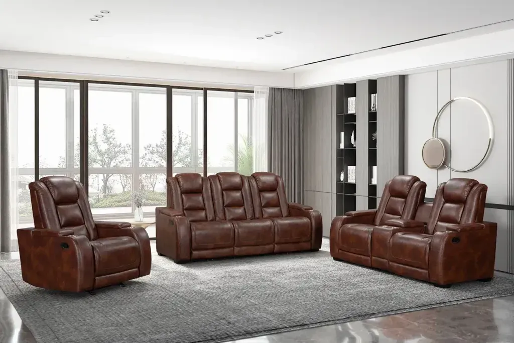 Brown leather living room sofa set in a bright modern room with large windows and gray rug