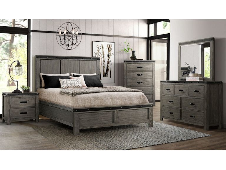 Modern gray bedroom set with bed, dresser, mirror, chest, nightstand, and rug in a bright room