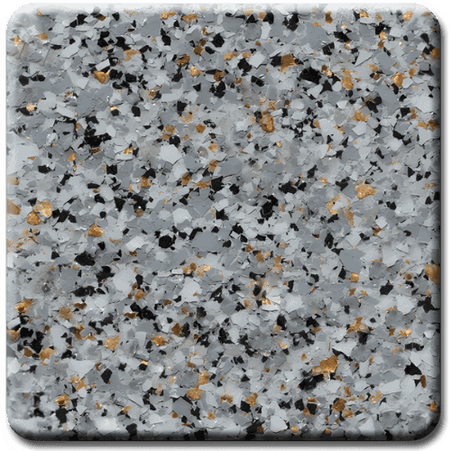 Close-up of a speckled, mottled pattern featuring gray, black, and gold flakes.