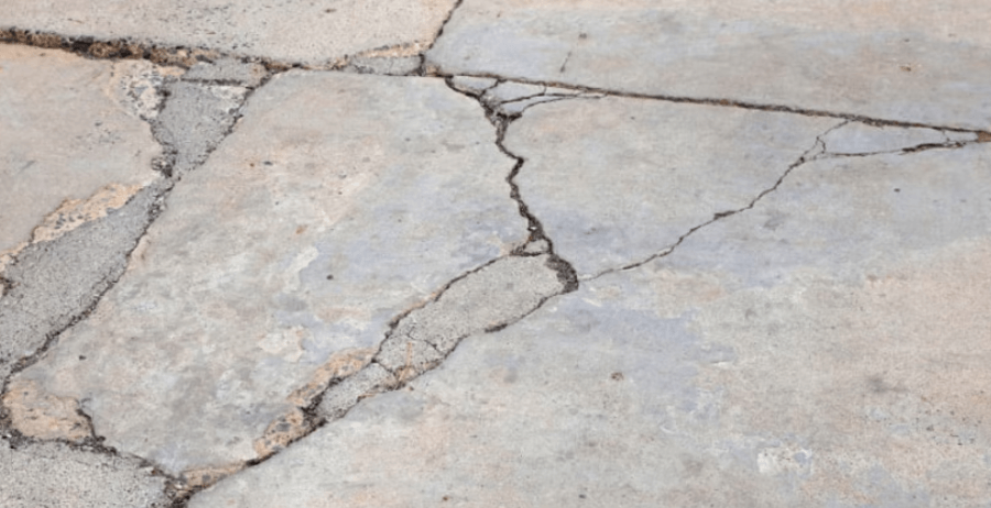 concrete contractor repairs a driveway in queen creek AZ