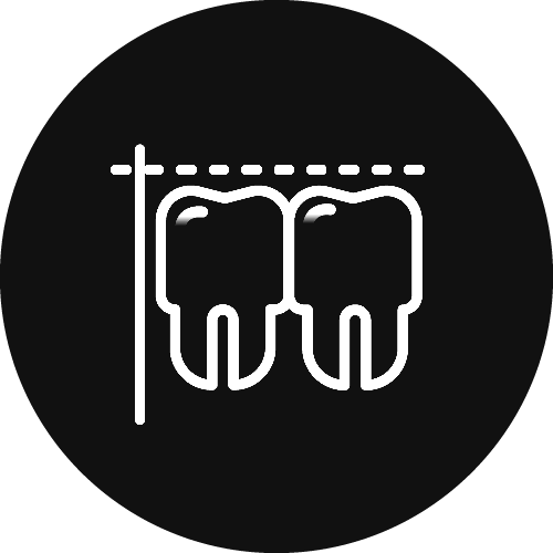 a black and white icon of three teeth hanging on a pole .