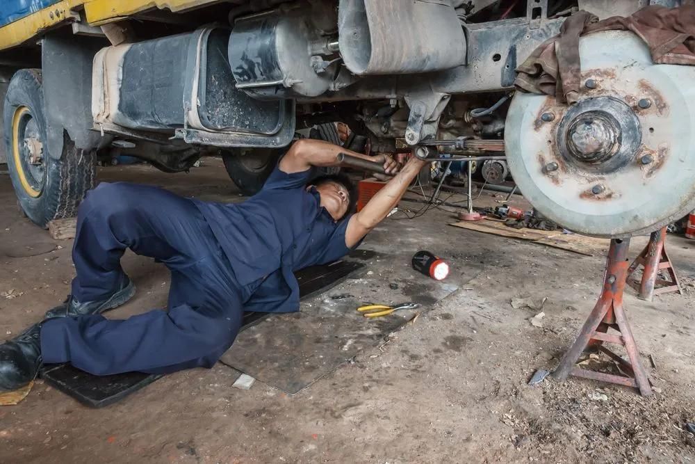 Mechanic Repairing Heavy Vehicle Transmission Repairs In Townsville