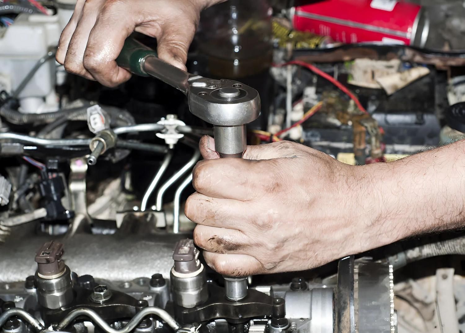 Mechanic Using Tools During Transmission Repairs In Townsville