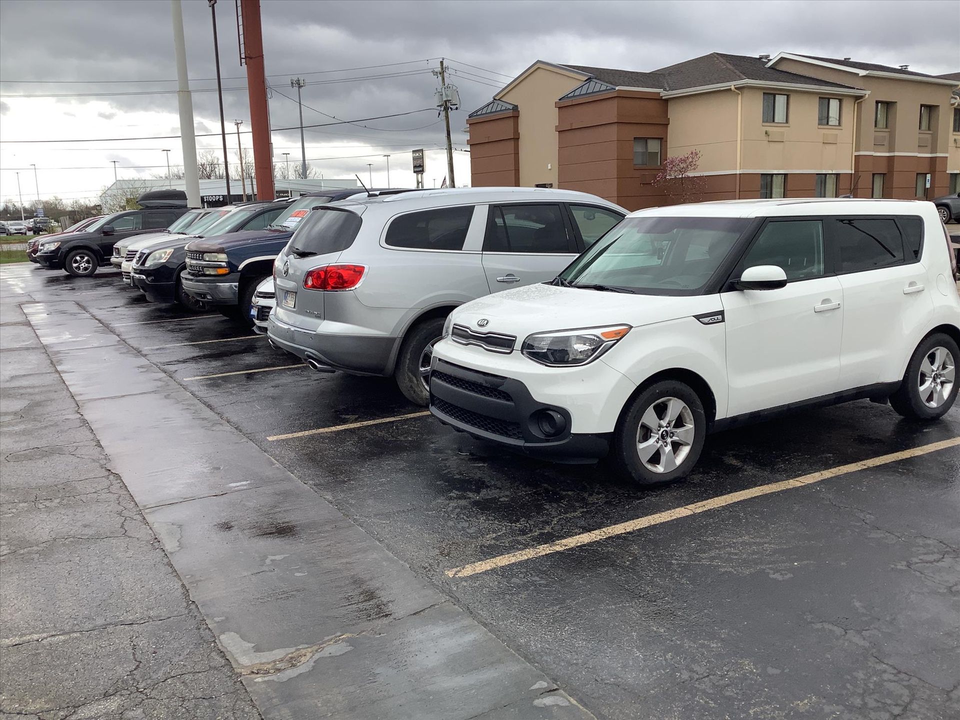 Cars Parked Outside of Auto Shop | Sparks Auto Care