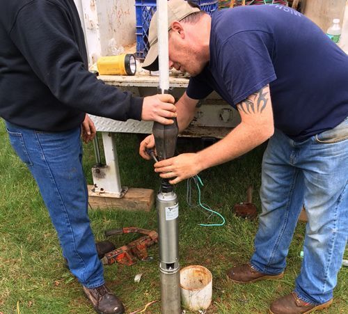 Messick Plumbing Team is working on upgrading a well water pump