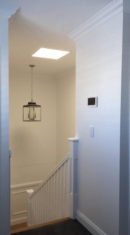 Hallway with a staircase and skylight — Lilydale, QLD — SunCity Skylights