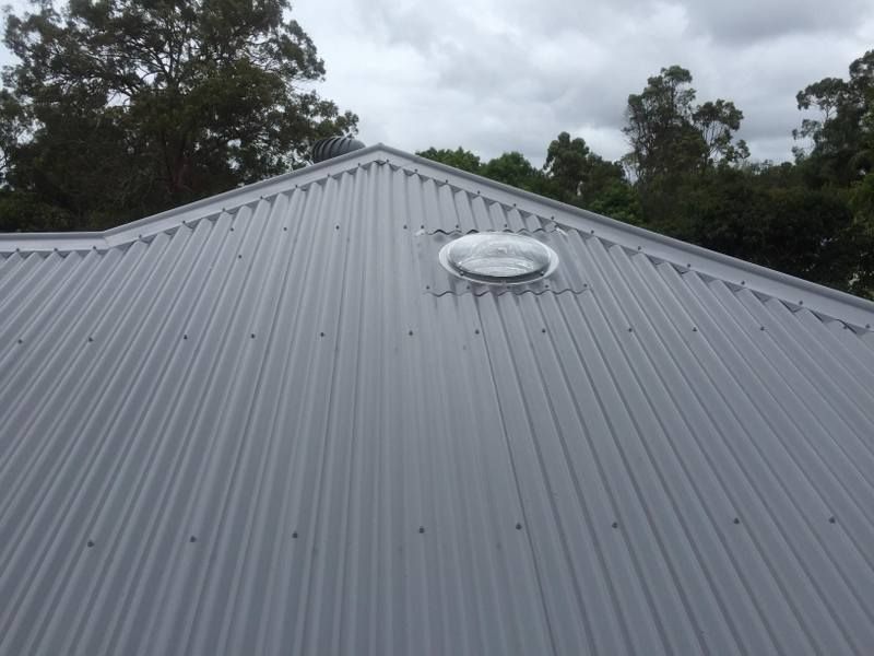Metal roof with tubular skylight — Lilydale, QLD — SunCity Skylights